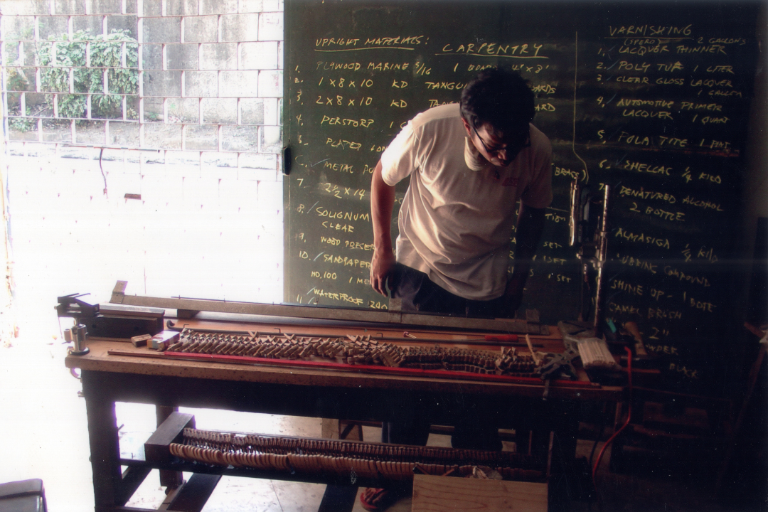 Technician Jaime Pastorfide at work on the project at the old piano factory in Parañaque City. Image taken from Arvin and Alwin Reamillo’s photo archive, courtesy of Arvin Reamillo.