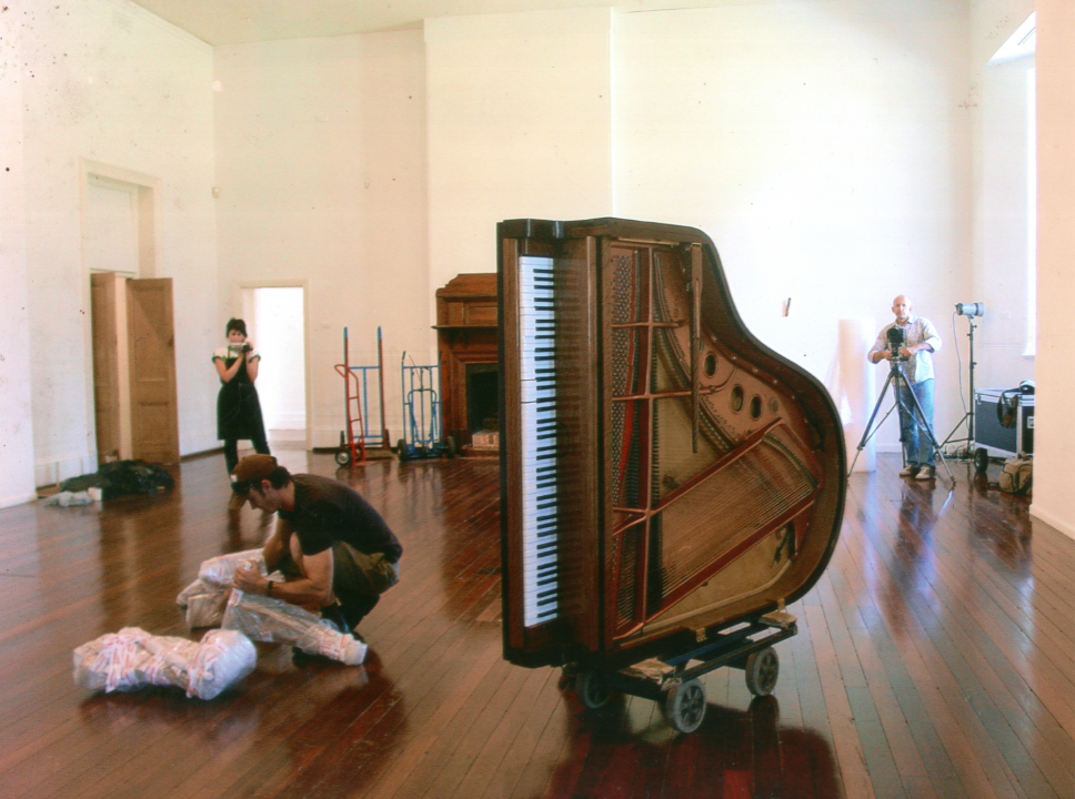 In the middle of installing. After the work was launched in the Philippines, the 'Mang Emo + Mag-himo Grand Piano Project' travelled to Fremantle Arts Centre, Australia. Image taken from Arvin and Alwin Reamillo’s photo archive, courtesy of Arvin Reamillo.